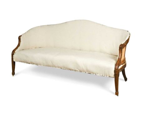 A George III Hepplewhite period mahogany sofa, the serpentine padded back with downscrolling arms raised on square tapered le