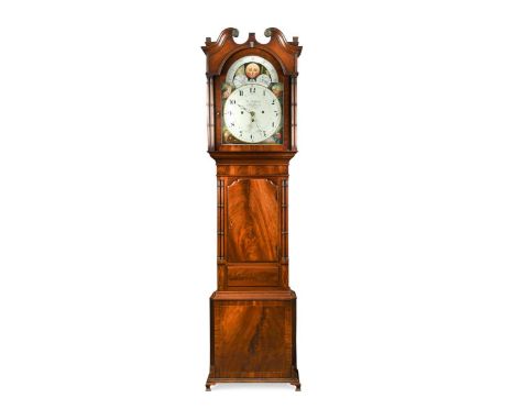 A mahogany chiming longcase clock, early 19th century,  the hood with swanneck pediment and twin columns flanking the 16inch 