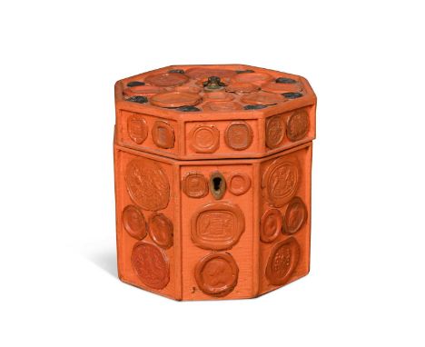 A red and black wax seal applied tea caddy, 19/20th century, the octagonal body partly applied with classical and armorial se