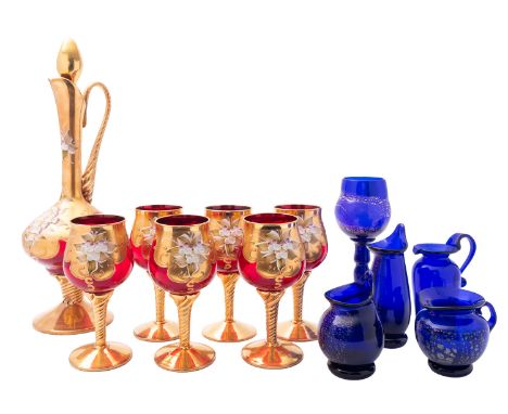 A Trefuochi Murano ewer and six matching goblets, the ruby body with applied gold and impasto flowers, ewer 40cm high togethe