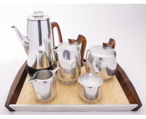 A Picqout Ware New Made 'magnalium'  tea /coffee service, circa 1950s; comprising coffee and tea pots with stained wood handl