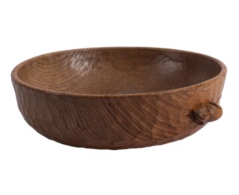 An adzed and carved oak fruit bowl, by Robert 'Mouseman' Thompson; of circular section; 7 cm high, 24 cm wide