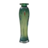 An art glass vase of elongated form the square base rising to circular shoulders with short flaring