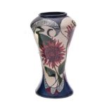 A Moorcroft Black Ryden pottery vase of waisted form painted with panels of deep red chrysanthemum,
