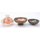 Three pieces of John Moorcroft pottery,