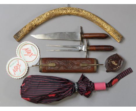 A Mary Quant ladies’ umbrella; an eastern carving knife &amp; fork in a carved hardwood case; a carved whalebone coat-hanger,