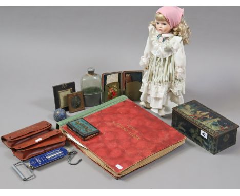 A vintage Mackintosh confectionery tin; two BP Air Baggage scales, cased; a set of 78rpm records,&nbsp;a polychrome-decorated