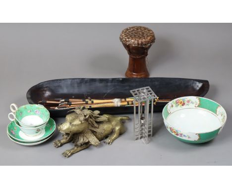 A modern ‘Charles Rennie Mackintosh’ pewter candlestick, 16.75cm high, boxed; together with a cast-brass recumbent lion ornam