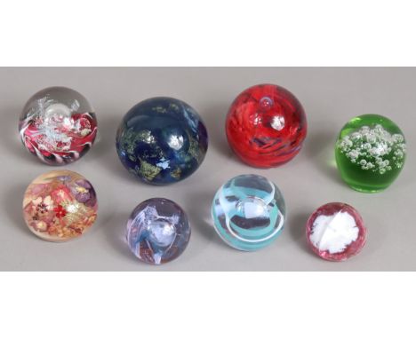 Three Caithness glass paperweights “Journey Red”, “Moon Crystal” &amp; “Streamers”; &amp; five various other glass paperweigh