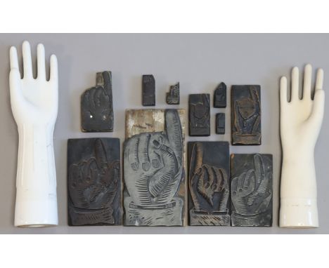A collection of eleven vintage manicule type-sets (24cm x 12cm to 4cm x 1.5cm together with two 1960s ceramic glove moulds.  
