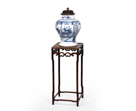 Blue and white baluster vase Chinese, Kangxi period (1662 - 1722) decorated to the centre depicting officials sat in a pavili