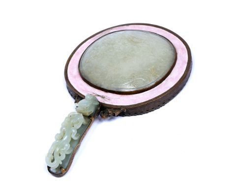 Jade and metal mounted hand mirrorChinese, 18th/19th Centurythe jade plaque on the top carved with flowers and precious objec