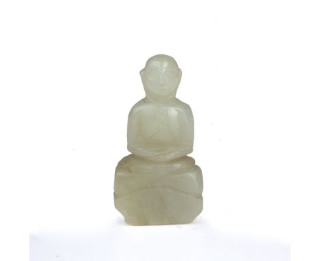 Miniature jade figure of a buddha Chinese the carved figure seated and with arms clasped, 4.25 cm Condition: natural flaws an