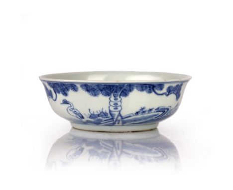 Blue and white bowl Chinese, 20th Century painted to the sides with a crane and pine tree, the reverse with an inscription, f