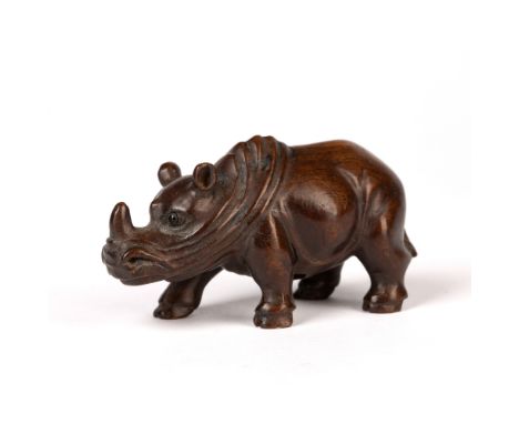 Contemporary wooden netsuke Japanese depicting a standing rhino, signed Meizan, 6cm across
