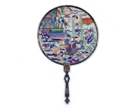 Fabric decorated fan Chinese, 19th Century with a black lacquer handle and frame, the lacquer handle decorated in parts with 