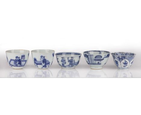 Five blue and white teabowls Chinese, Kangxi and later decorated with various scenes including gardens, three with painted ma
