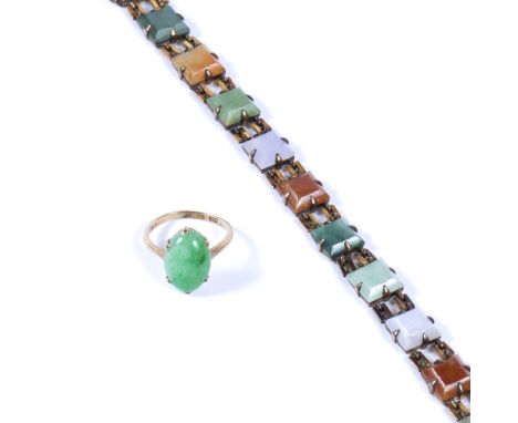 Vari-coloured jade panel bracelet comprising a line of vari-coloured jade and hardstone panels in claw settings and a jade ca