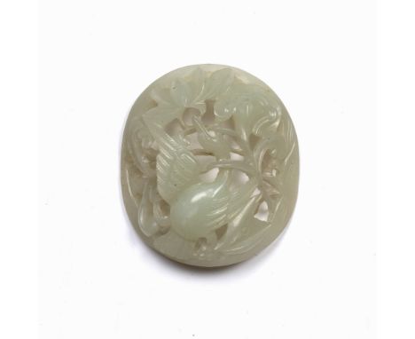Oval jade oval mount / plaque Chinese, 19th Century carved with a phoenix eating a plant, 5.75cm long Condition: natural incl