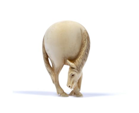 Ivory netsuke of a horse Japanese, 19th Century in the 18th Century style, 9cm high