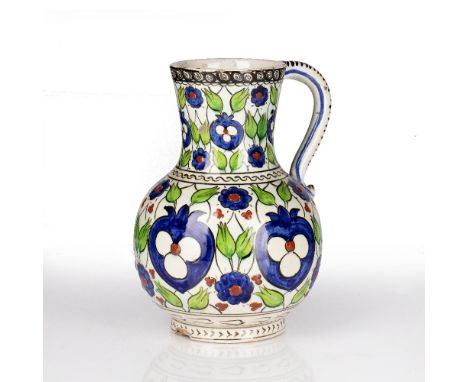 Cantagalli Iznik pattern jug Italian, 19th Century decorated to the exterior with brightly coloured flowers in green and blue