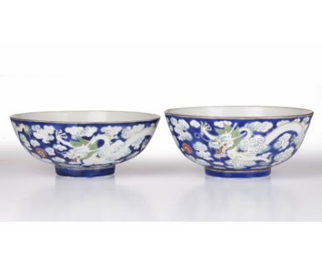 Pair of porcelain bowls Chinese, Daoguang mark and period decorated to the exterior in colourful enamels depicting dragons fl