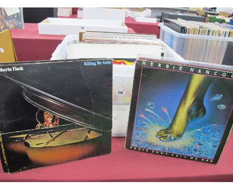 Seventy L.Ps, in this varied collection with titles that includes, Bob Marley - Survival, Human league - Dare, Chris Rea - Wa