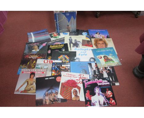 Approximately Seventy LPs In This Box of Mixed Genres, highlights include, Yes - Going For The One, Peter Frampton - Comes Al