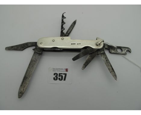 Sampson Morden: A Multi-Tool Knife, with silver hallmarked scales, two blades, bottle opener, tin opener, spanner and file, 9
