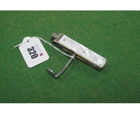 Stan Shaw; A Smokers Knife, with two blades, nail file, spike, cutter, tamper, scraper and cigar fork, mother of pearl scales