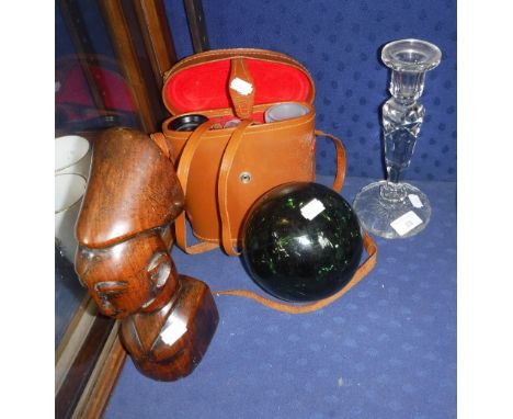 A TRIBAL CARVING OF A HEAD, a pair of 'Gold Crest' binoculars, a cut-glass candlestick and a green glass fishing float 