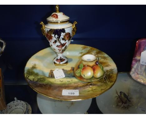 A ROYAL WORCESTER PLATE decorated with a view of Oystermouth Castle, a Coalport bowl painted by M .Dennis, and a Coalport lid