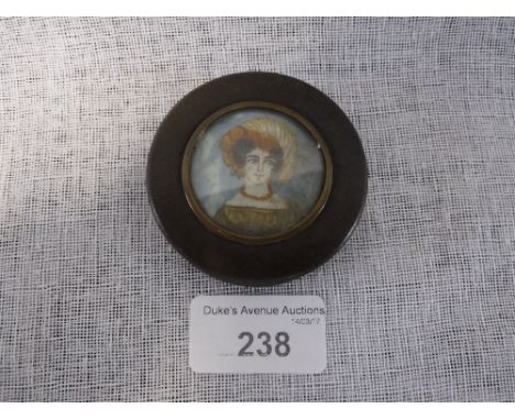 A SMALL SNUFF BOX, the circular lid mounted with a portrait miniature