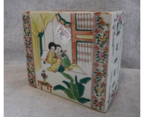 A CHINESE CERAMIC SLAB VASE/HEADREST decorated with figures in an interior