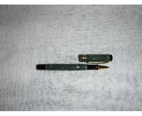 A PARKER GREEN CASED ROLLER BALL PEN