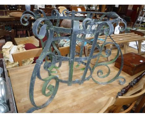 A LARGE WROUGHT IRON GARDEN PLANTER, in the form of a handled basket