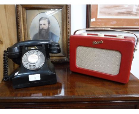 A VINTAGE BLACK BAKELITE TELEPHONE with 'Aptofone' receiver and a red cased Roberts Radio