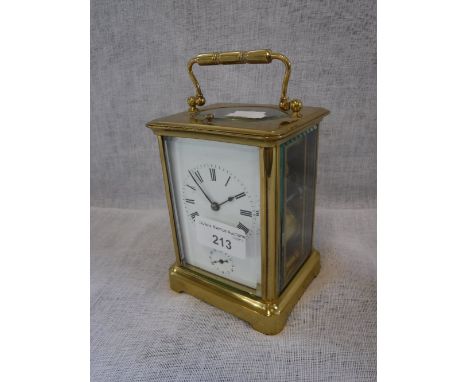 A BRASS-CASED  REPEAT AND ALARM CARRIAGE CLOCK with white enamel dial