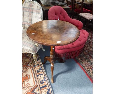 A GEORGE III TRIPOD TABLE, 22" diameter