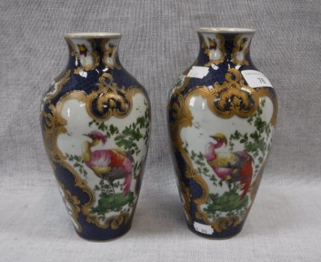 A PAIR OF 18TH CENTURY WORCESTER PORCELAIN VASES decorated with exotic birds within cartouches on a blue scale ground 9" high