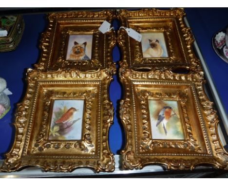 E R BOOTH, WORCESTER; A COLLECTION OF FOUR WILDLIFE STUDIES painted on porcelain in gilt frames