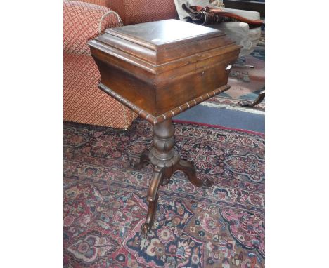 A VICTORIAN ROSEWOOD WORK TABLE on a tripod support