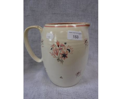 A POOLE POTTERY JUG decorated with pink floral sprays against a cream ground