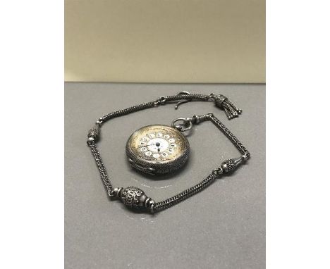 LADIES SILVER FOB WATCH ON A FANCY SILVER ALBERT