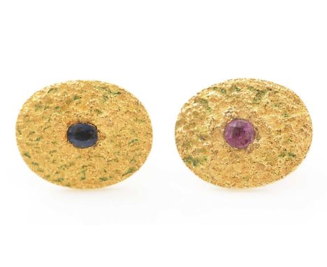 A pair of sapphire and ruby and 18ct yellow gold earrings, each set with either an oval facet cut sapphire or ruby, in oval t