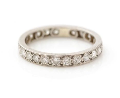 A diamond eternity ring, set with twenty-six brilliant cut diamonds weighing a total of approximately 1.30carats, in platinum