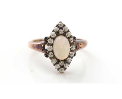 A Victorian opal and diamond ring, the oval opal cabochon measuring 7.1 x 5.1mm surrounded by eight cut diamonds in marquise 