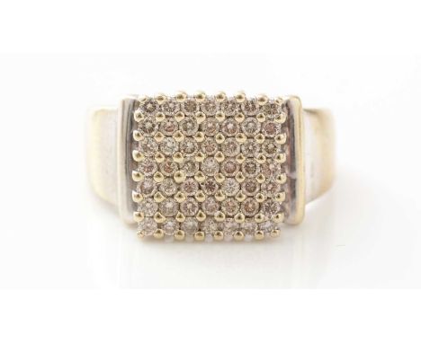 A gentleman's diamond plaque ring, pave set with forty-two brilliant cut diamonds, estimated to weigh a total of approximatel