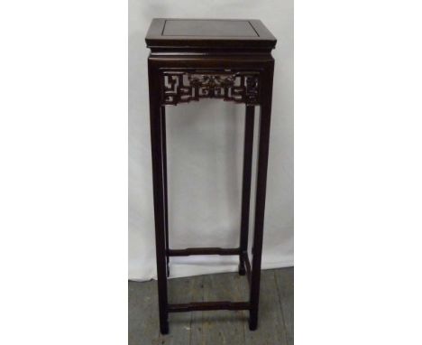 Chinese rectangular hardwood stand, scroll pierced band all on four moulded rectangular legs