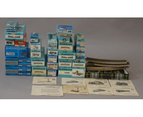 H0 Scale. Marklin. Boxed accessories, rolling stock & track.(31) Together with some unboxed track pieces. Overall VG.